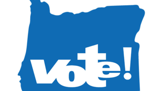 The word vote with an exclamation point is imposed over an outline of the state of Oregon